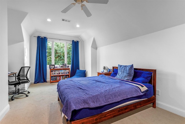 carpeted bedroom with ceiling fan and lofted ceiling