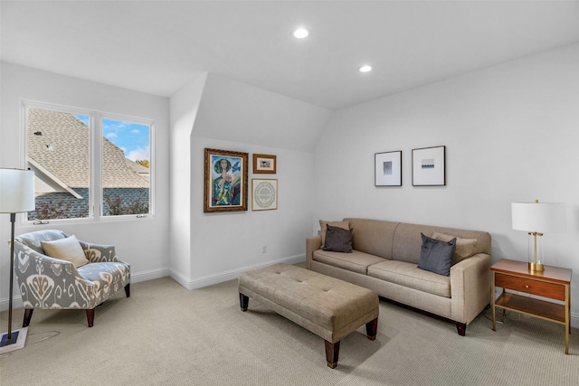 living room featuring light colored carpet and lofted ceiling