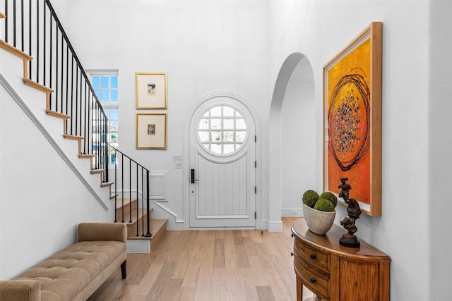 foyer with light hardwood / wood-style floors