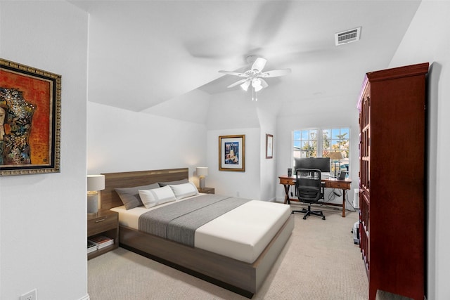 bedroom with light carpet, ceiling fan, and lofted ceiling