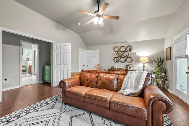 living room with lofted ceiling, baseboards, a ceiling fan, and wood finished floors