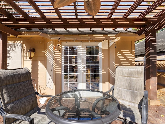 view of patio / terrace featuring a pergola and french doors