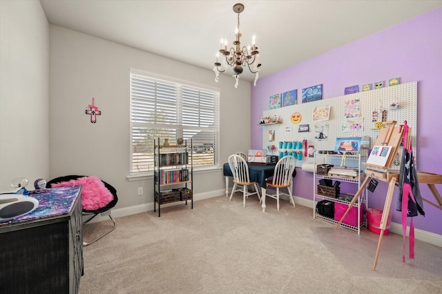 carpeted home office with an inviting chandelier