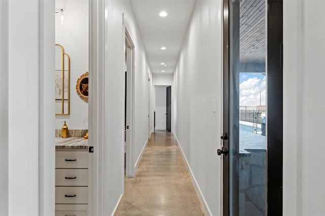 353 Willow Moon Ranch Rd, Crawford, TX 76638 - corridor with concrete floors, baseboards, and recessed lighting