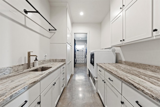 353 Willow Moon Ranch Rd, Crawford, TX 76638 - clothes washing area with recessed lighting and cabinet space