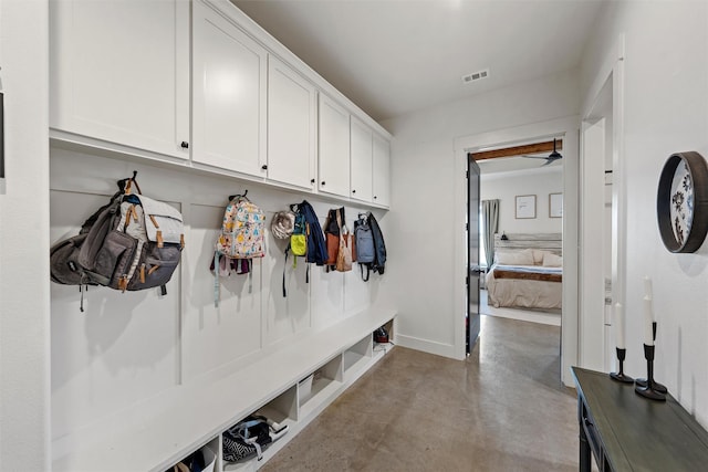 353 Willow Moon Ranch Rd, Crawford, TX 76638 - mudroom with finished concrete flooring and baseboards