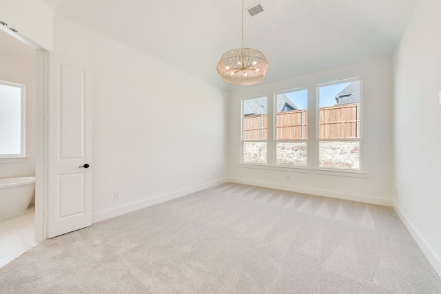 912 Shady Oaks Dr, Rockwall, TX 75087 - carpeted spare room featuring a chandelier and baseboards