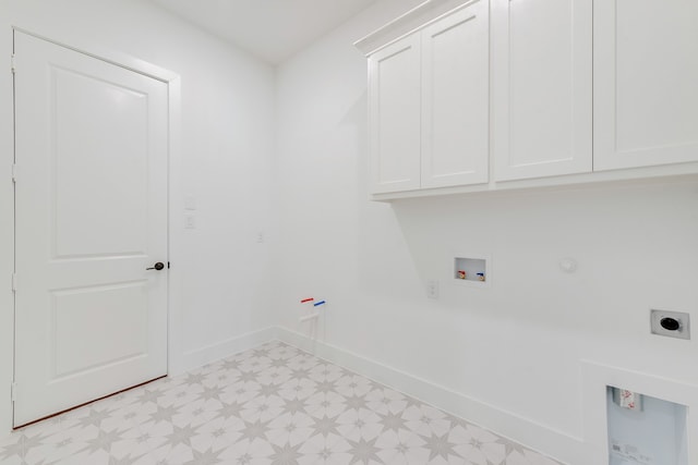 912 Shady Oaks Dr, Rockwall, TX 75087 - washroom featuring light floors, cabinet space, electric dryer hookup, hookup for a washing machine, and hookup for a gas dryer