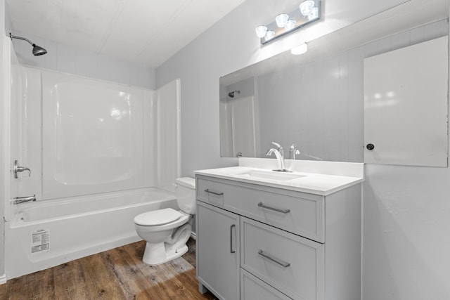 full bathroom with wood-type flooring, vanity, toilet, and shower / bathtub combination