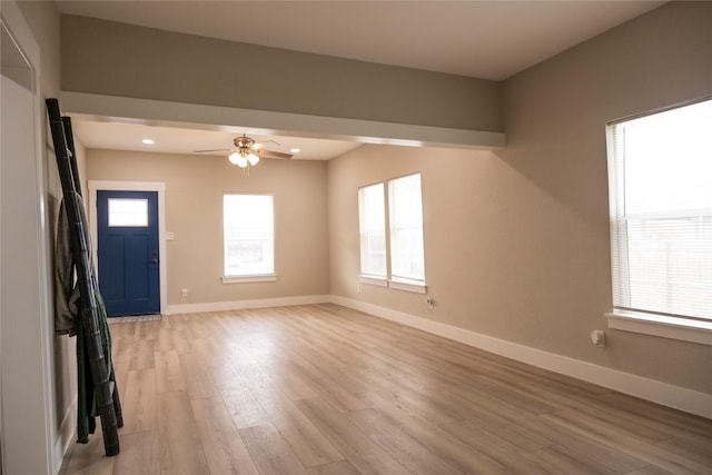 interior space featuring light hardwood / wood-style flooring and ceiling fan