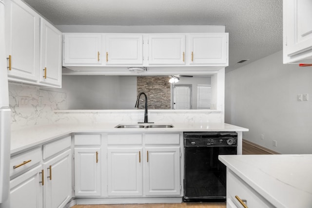 kitchen with dishwasher, sink, tasteful backsplash, light hardwood / wood-style flooring, and white cabinets