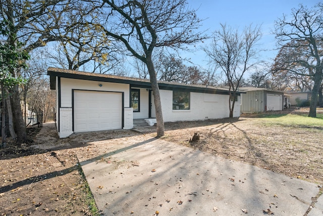 single story home with a garage