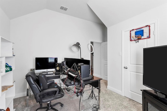 home office featuring vaulted ceiling