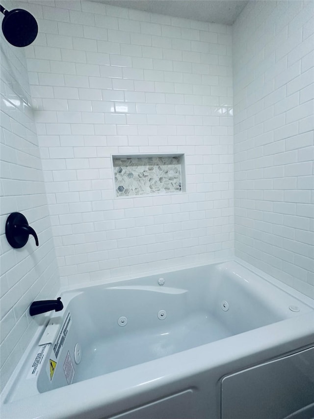 bathroom featuring a whirlpool tub