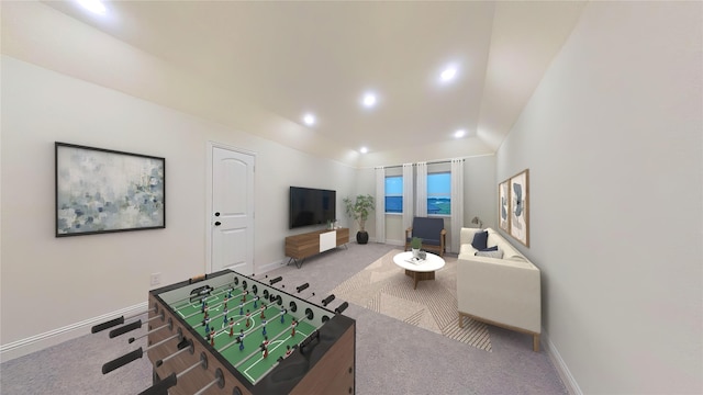 recreation room with carpet floors and lofted ceiling