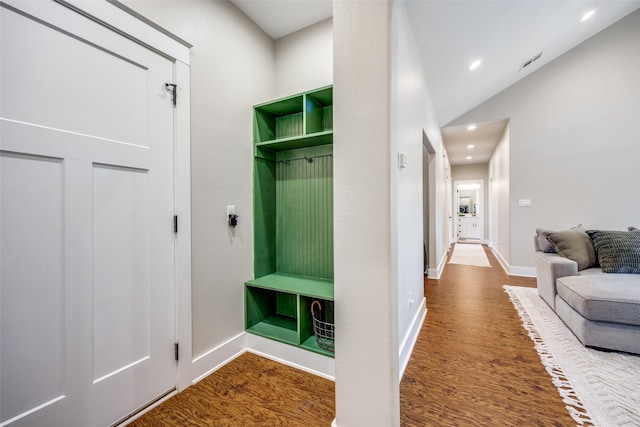 mudroom with dark hardwood / wood-style floors