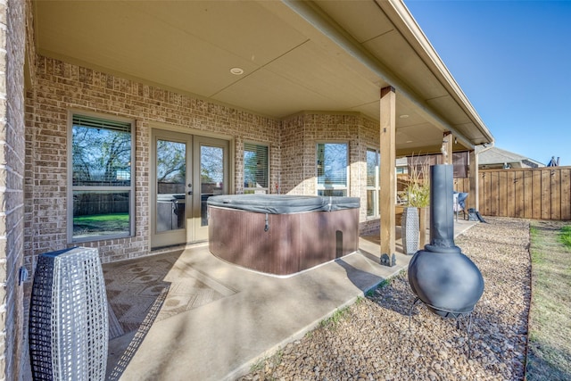 view of patio with a hot tub