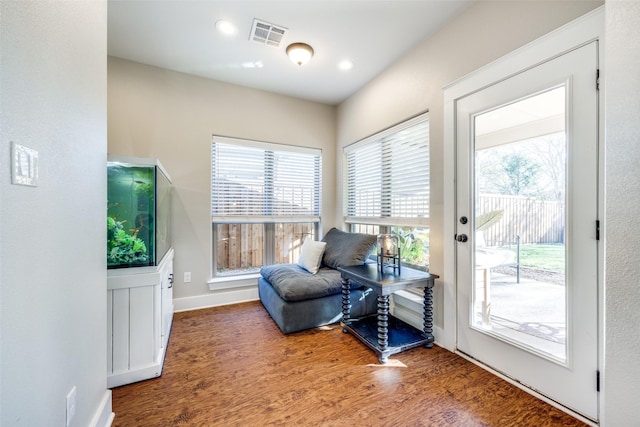 living area with dark wood-type flooring