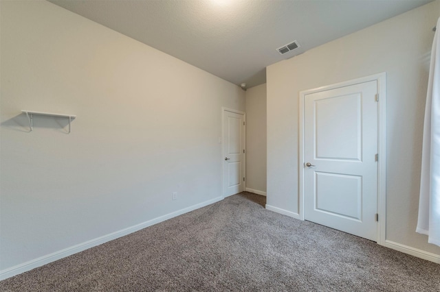 unfurnished bedroom featuring carpet flooring