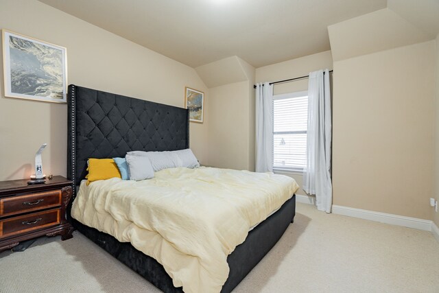 bedroom with light carpet