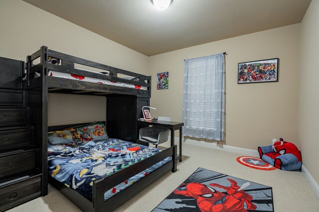 bedroom featuring carpet flooring