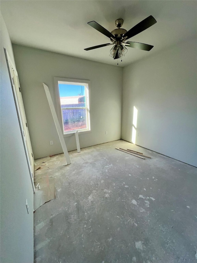 spare room with ceiling fan