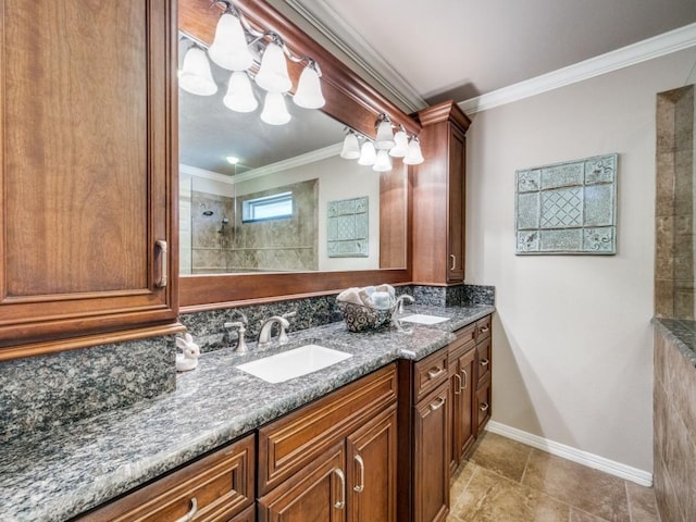 bathroom featuring vanity, crown molding, and tiled shower