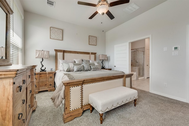 carpeted bedroom featuring connected bathroom and ceiling fan