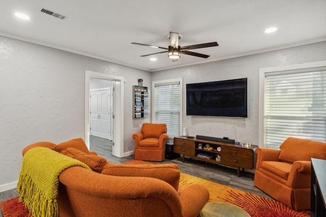 living room with dark hardwood / wood-style floors and ceiling fan