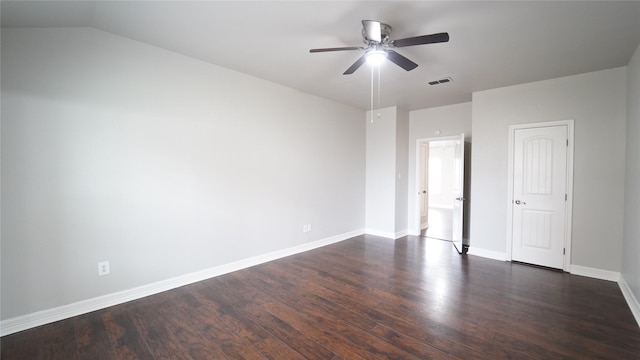 unfurnished bedroom with vaulted ceiling, ceiling fan, and dark wood-type flooring