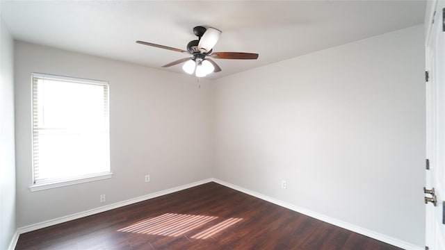 unfurnished room featuring dark hardwood / wood-style flooring, ceiling fan, and a healthy amount of sunlight