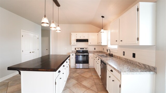 kitchen with white cabinets, appliances with stainless steel finishes, vaulted ceiling, and sink