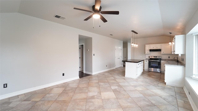 kitchen with electric range, lofted ceiling, white cabinetry, and hanging light fixtures