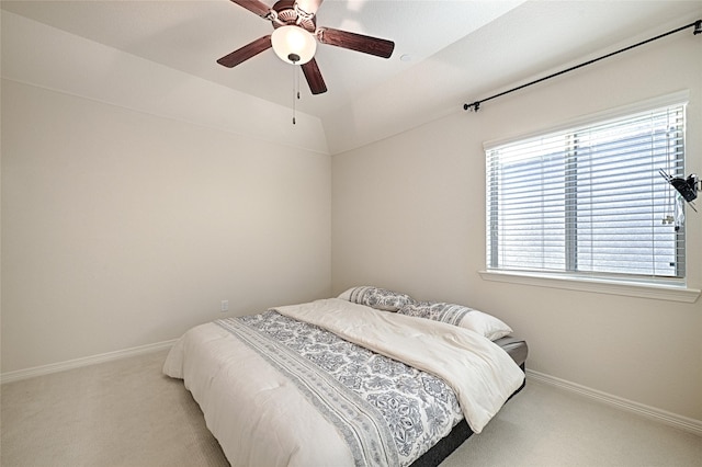 bedroom with light carpet and ceiling fan