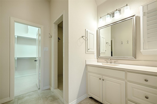 bathroom featuring vanity and walk in shower