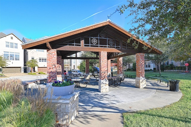 view of home's community with a gazebo and a patio area