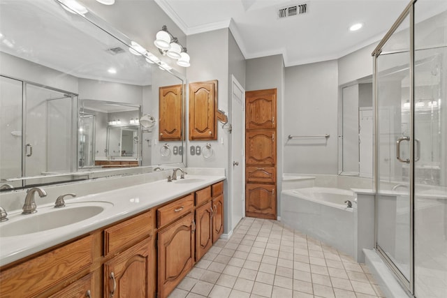 bathroom featuring tile patterned flooring, vanity, separate shower and tub, and crown molding