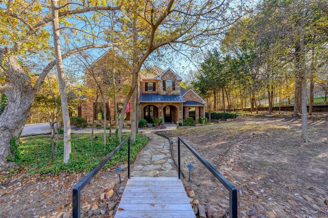 588 Lakepoint Loop, Pottsboro, TX 75076 - view of front of property with covered porch and a metal roof