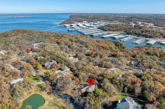 drone / aerial view with a water view