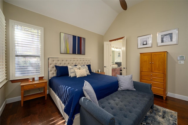 bedroom featuring baseboards, a ceiling fan, connected bathroom, dark wood-style floors, and vaulted ceiling