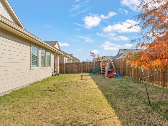 view of yard featuring a playground