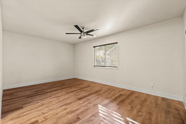 spare room featuring light hardwood / wood-style floors