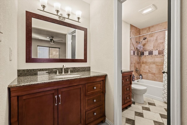 full bathroom with vanity, toilet, shower / bathtub combination with curtain, and ceiling fan