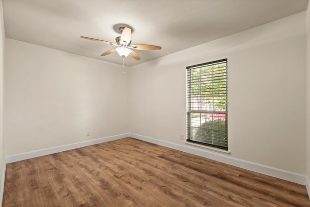 empty room with wood-type flooring