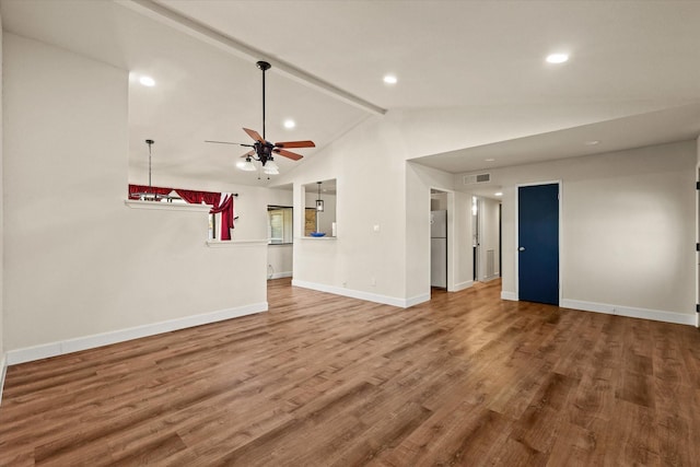 unfurnished living room featuring vaulted ceiling with beams, ceiling fan, and wood-type flooring