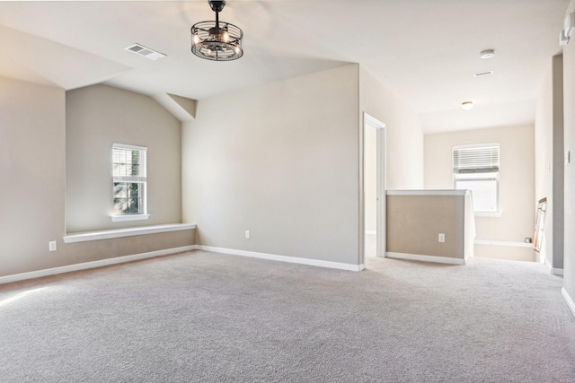 2812 Merry View Ln, Fort Worth, TX 76120 - carpeted empty room with baseboards, visible vents, and lofted ceiling