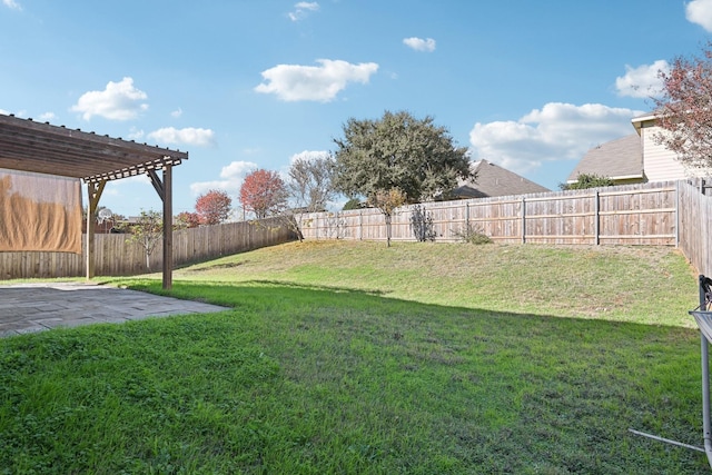 view of yard featuring a patio area and a pergola