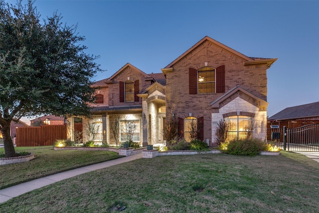 view of front of home with a yard