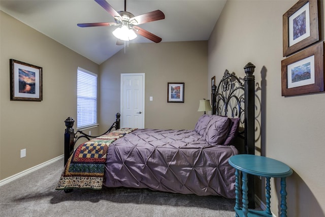 bedroom with carpet flooring, ceiling fan, and vaulted ceiling