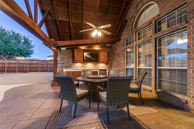 patio terrace at dusk with ceiling fan